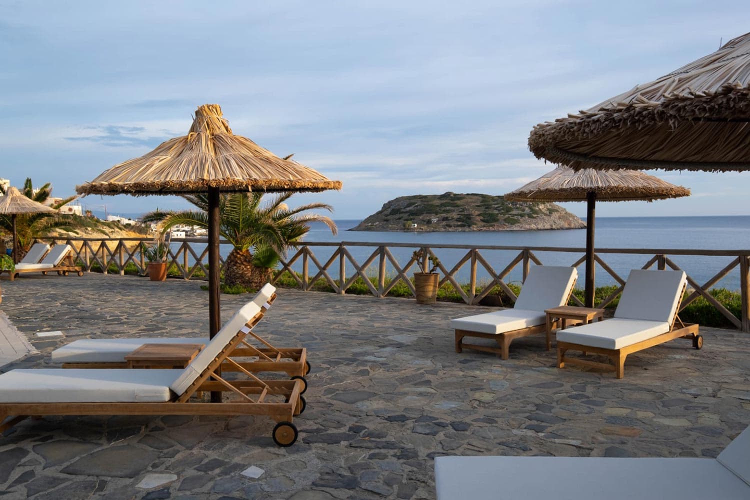 Views of the island of Mochlos from the poolside sunbeds