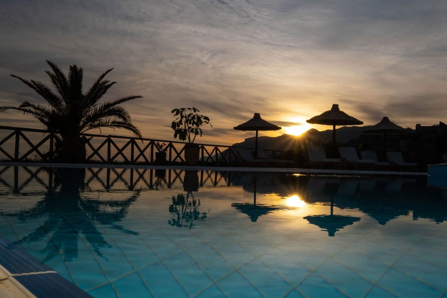 Evening view of the Aegean Sea from the pool terrace at Mochlos Blue